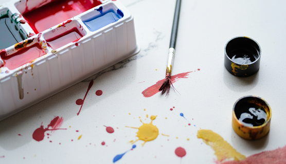 Ink and paint on the granite kitchen top