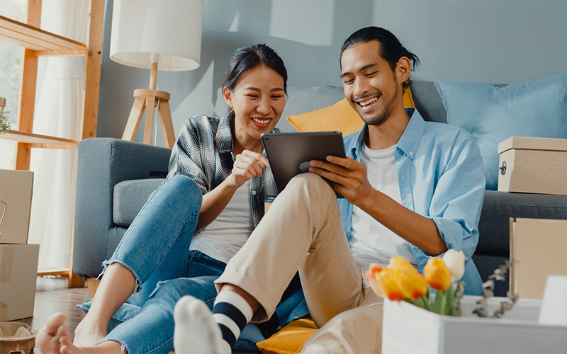 Asian couple planning home renovation