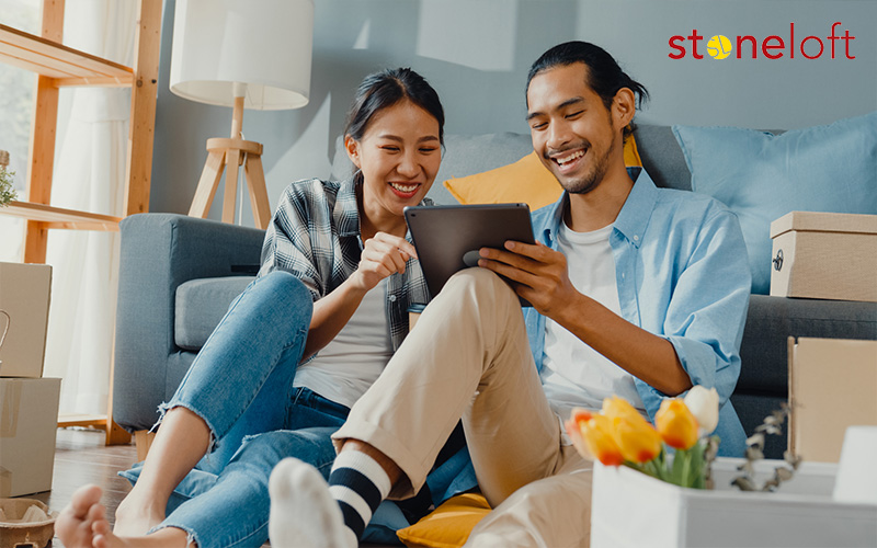 Asian couple planning home renovation