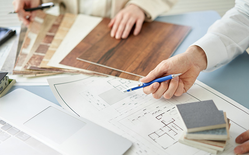 Owner and architect planning home renovation